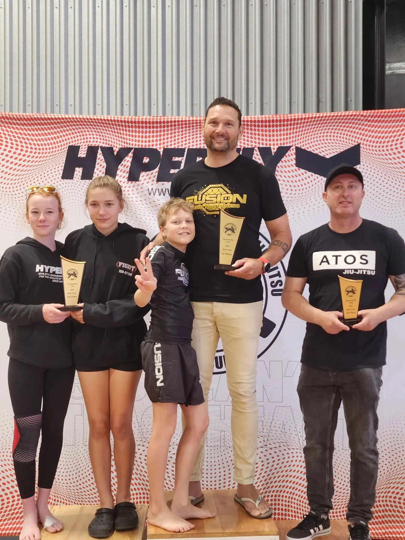 Junior bjj competitors with medals at The M A Connection